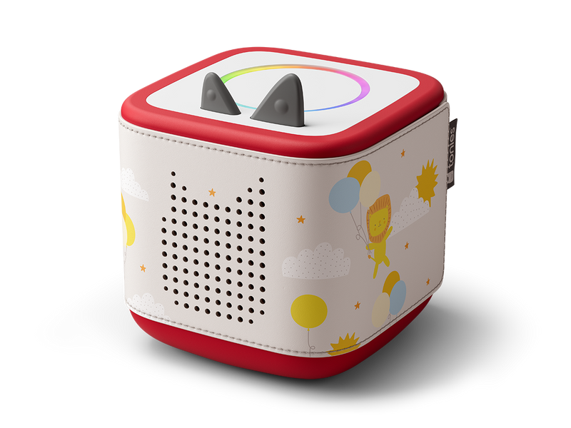 Side view of Toniebox 2 with lion, balloons, sun and clouds on it