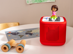 Child Playing With Dora Tonie Audio Figurine And Toniebox 2