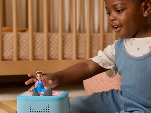 Child Playing With Ms. Rachel Tonie