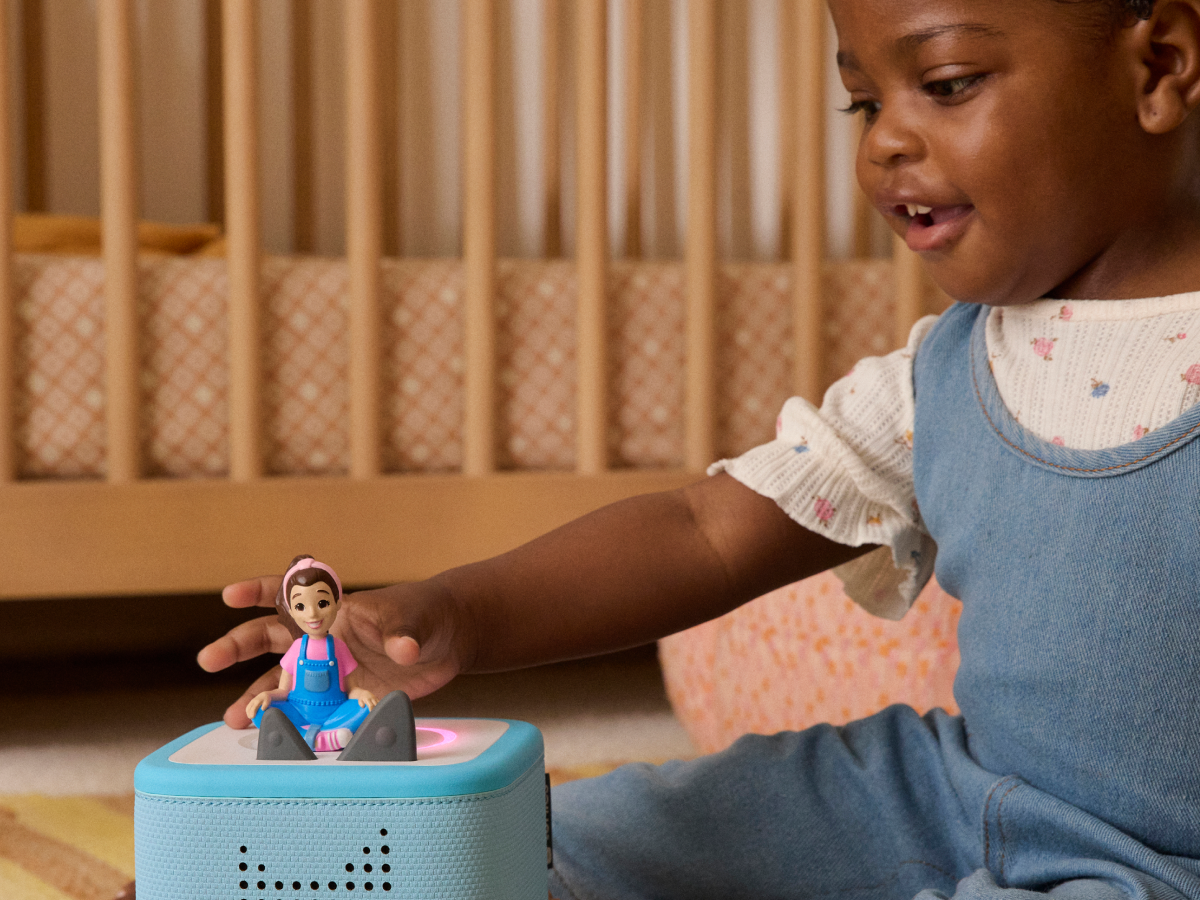 Child Playing With Ms. Rachel Tonie
