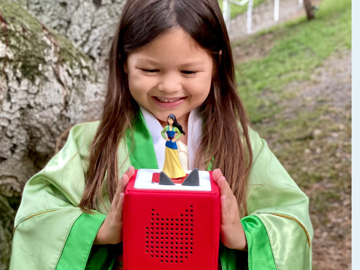 Child Playing With Disney Mulan Tonie