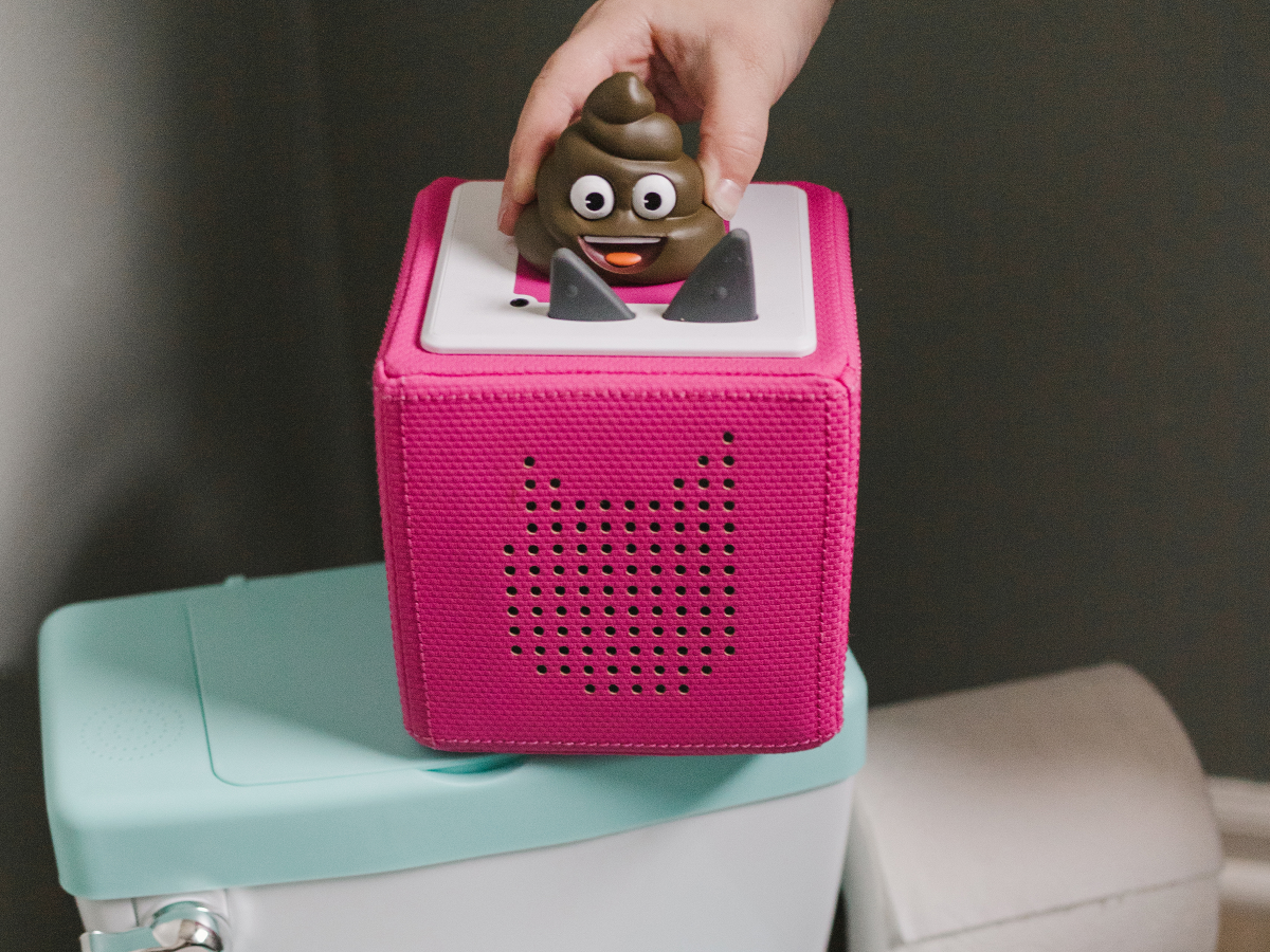 Child Playing With Potty Training Tonie