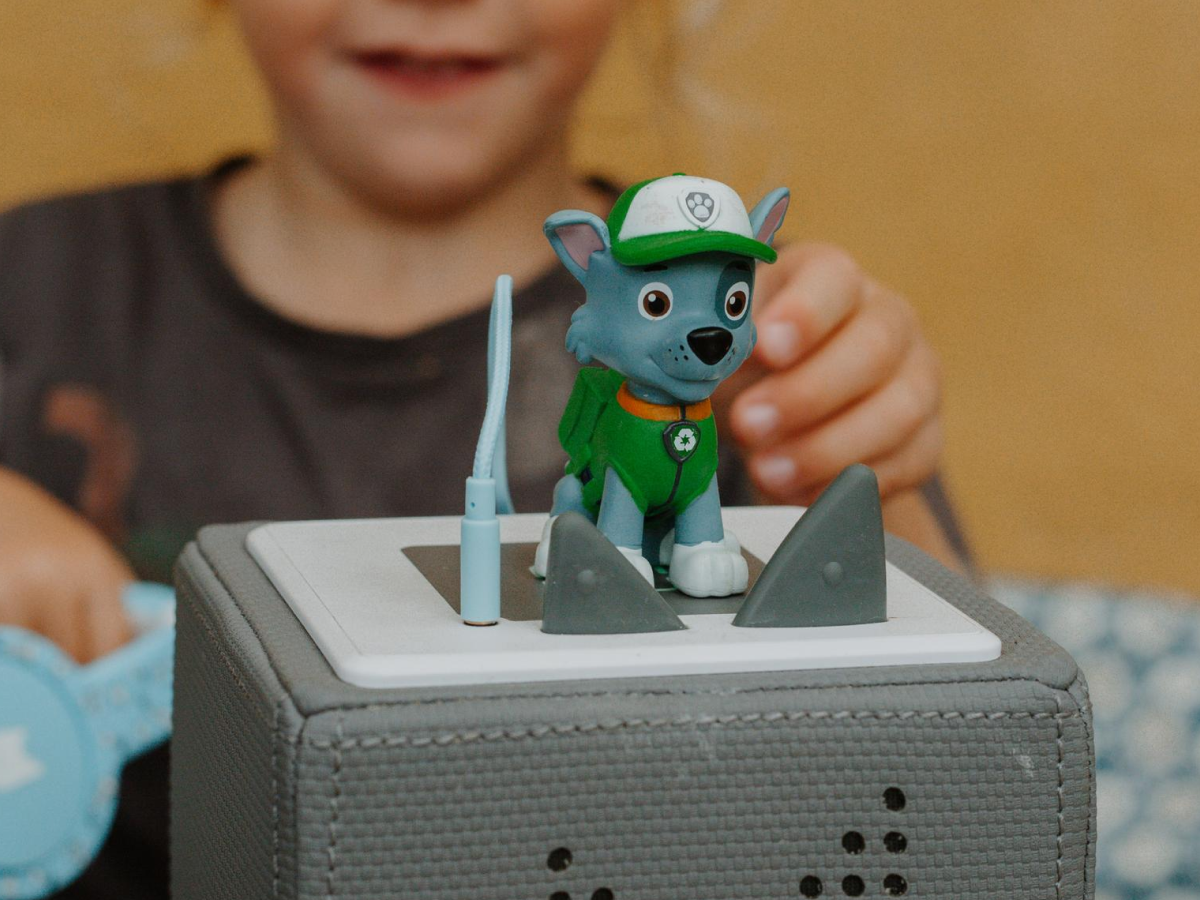 Child Playing With Rocky Tonie Audio Figurine And Toniebox 2