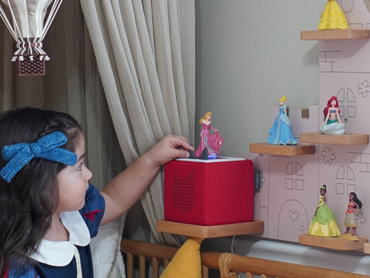 Child Playing With Disney Sleeping Beauty Tonie