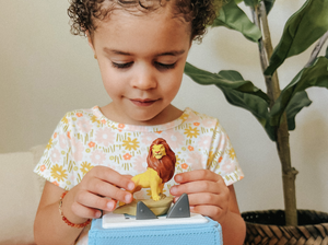 Child Playing With Disney The Lion King Tonie
