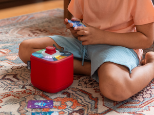 Kids Playing With A Red Toniebox 2 And The Quizzles Technology Tonieplay