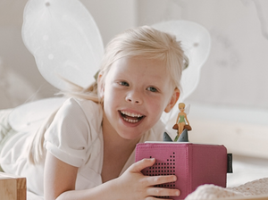 Child Playing With Disney Tinker Bell Tonie